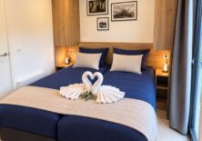 Slaapkamer 1 (opgemaakt bed)